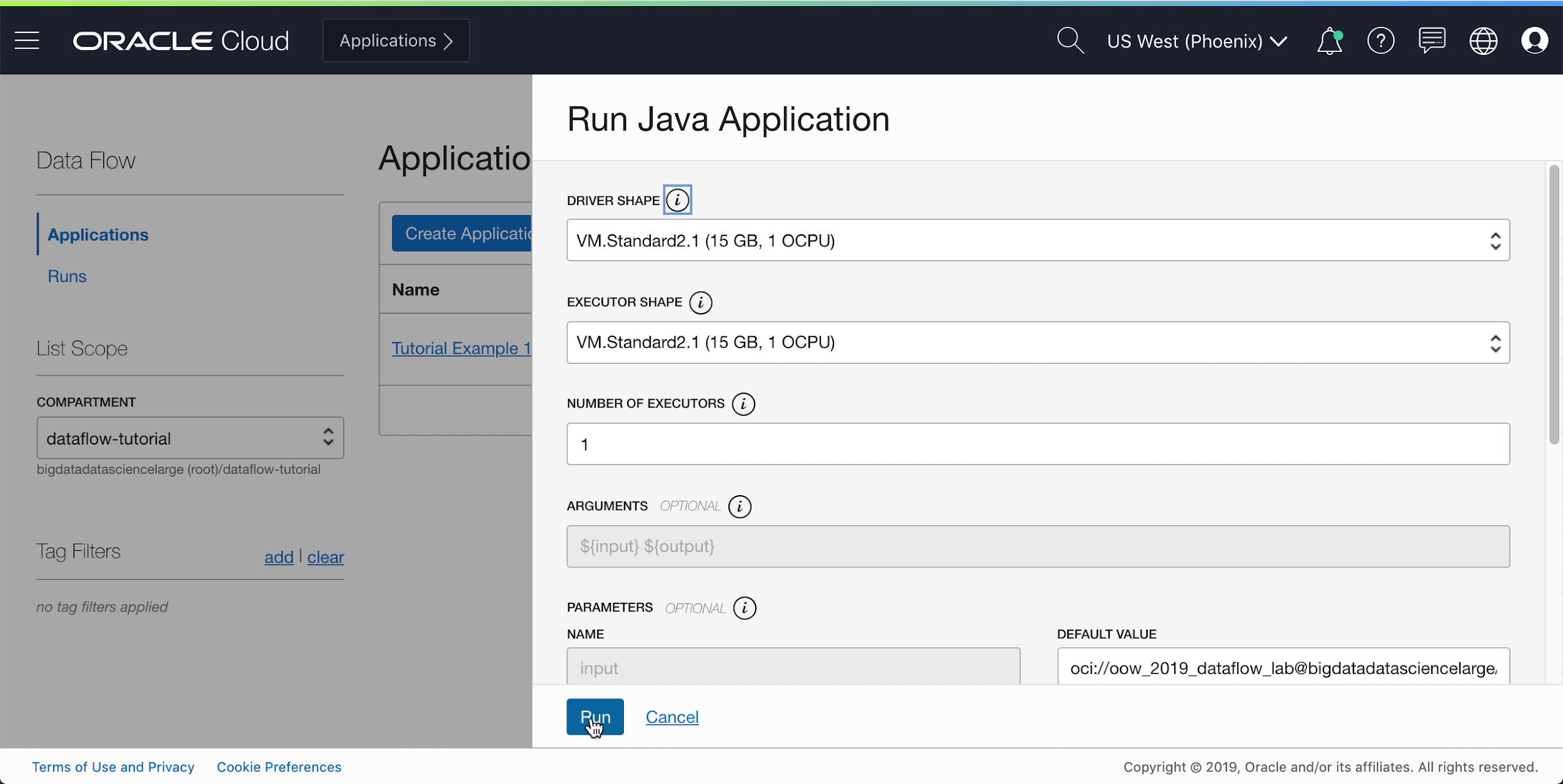 The Run Java Application pull-out page displayed over the right-hand side of the Applications page. At the top is a drop-down list called Driver Shape; VM.Standard2.1 (15GB, 1 OCPU) is selected. Below is a drop-down list called Executor Shape; VM.Standard2.1 (15GB, 1 OCPU) is selected. Below is a text field labelled Number of Executors; it contains 1. Below is a text field called Arguments. It is greyed-out and contains ${input} ${output}. Below are two text fields side by side for parameters. The first is called Name and is greyed-out, but contains input. The other is called Default Value and contains the input directory, but can be edited. There is a scroll bar to the right which is at the top position. At the bottom of the screen are two buttons, Run and Cancel. Run is about to be clicked.